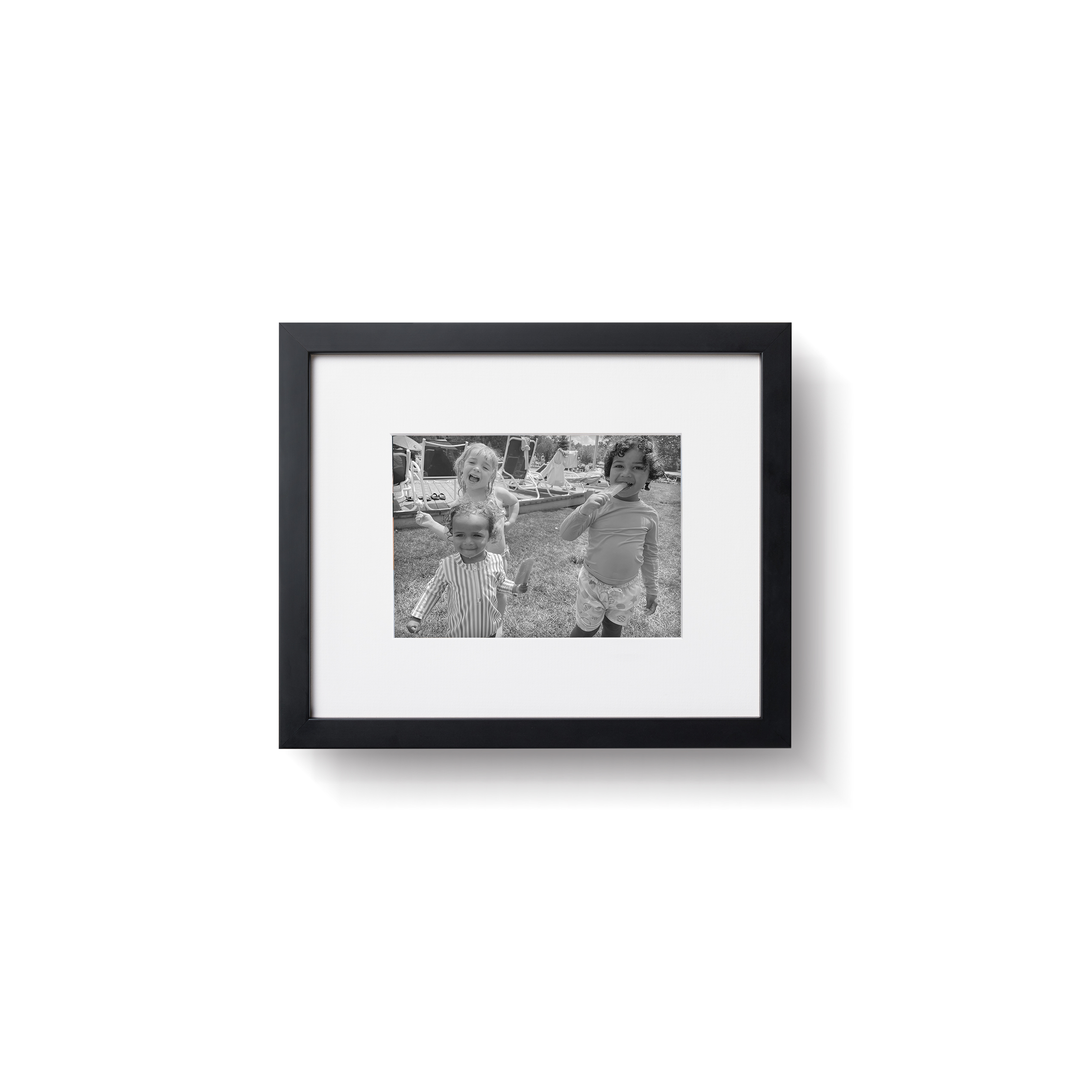photo of a family in front of mountains in black Mercer Slim frame